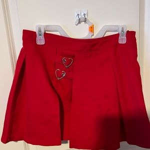 Red pleated skort